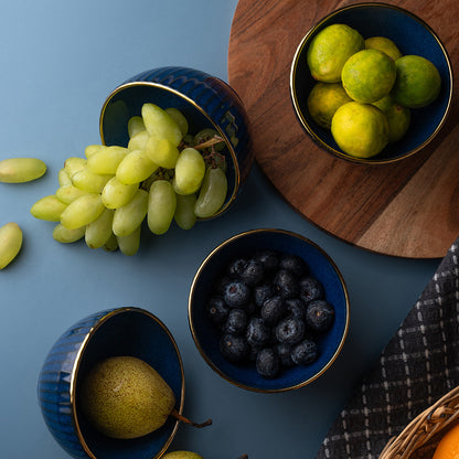 Elegant Blue Ceramic Bowl Set with Golden Rim – 4 Pcs
